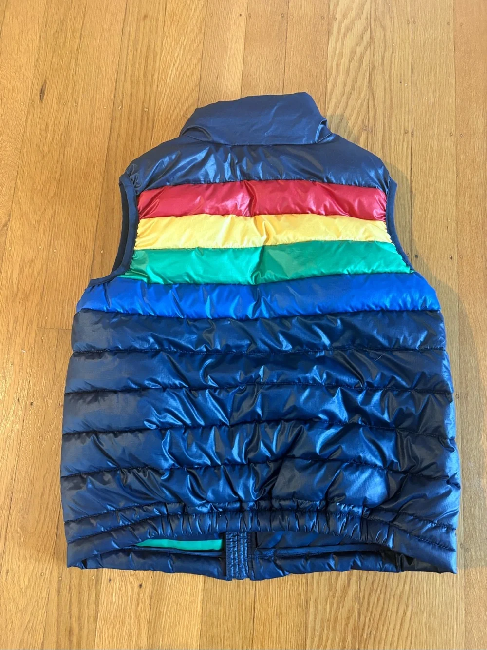 Primary rainbow stripe puffer vest